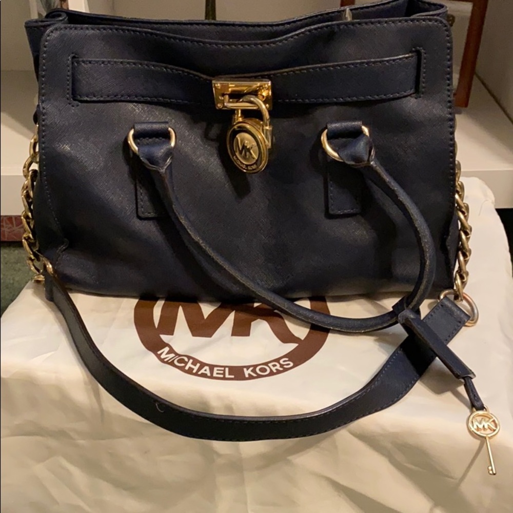 Micheal kors purse. Blue with gold.